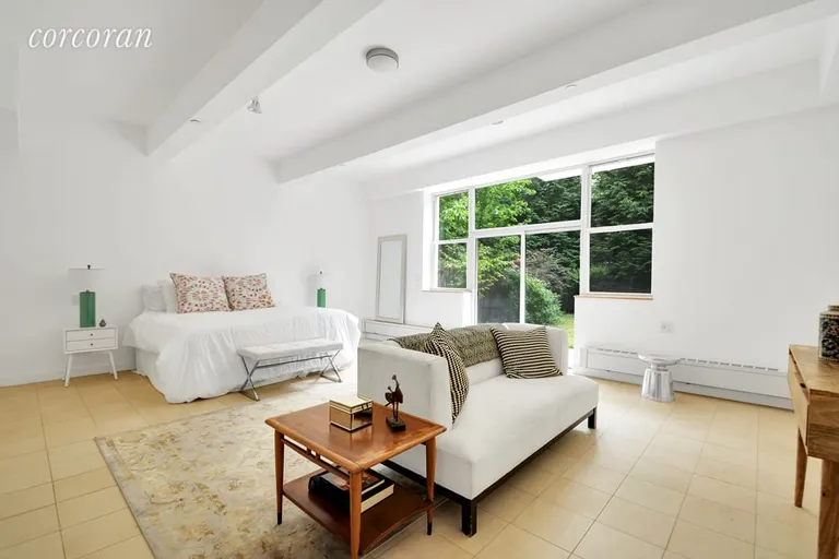 New York City Real Estate | View 324 Dean Street, 1B | Master Bedroom with access to private garden | View 9