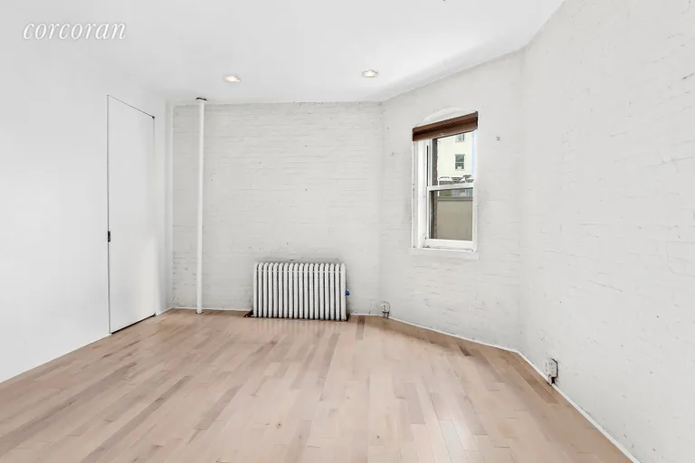 New York City Real Estate | View 165 Hudson Street, 5C | Big master bedroom with exposed brick  | View 4