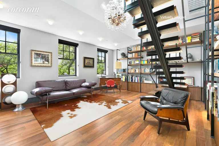 New York City Real Estate | View 327 West 22nd Street, 8 | Dramatic Double-Height Living Room | View 4