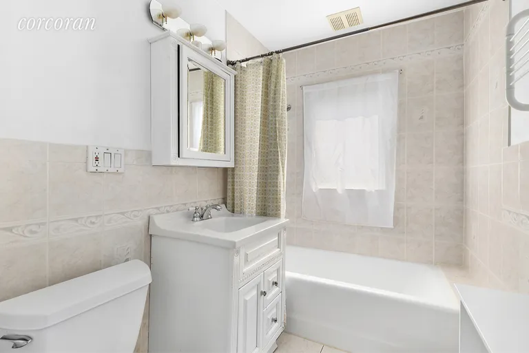 New York City Real Estate | View 95-38 72nd Avenue | Upstairs bathroom - Updated  | View 15