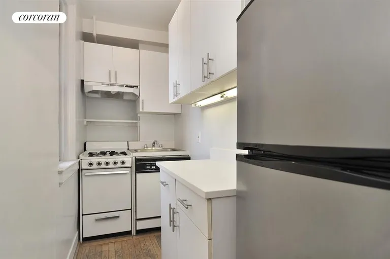 New York City Real Estate | View 333 East 53rd Street, 11A | Windowed Kitchen | View 6