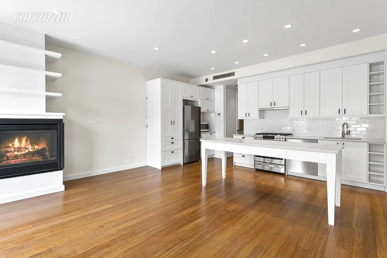 New York City Real Estate | View 25 West 94th Street, 2 | Open Kitchen with Island/Dining Table | View 5