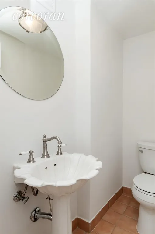 New York City Real Estate | View 340 East 64th Street, 18L | Powder Room | View 8
