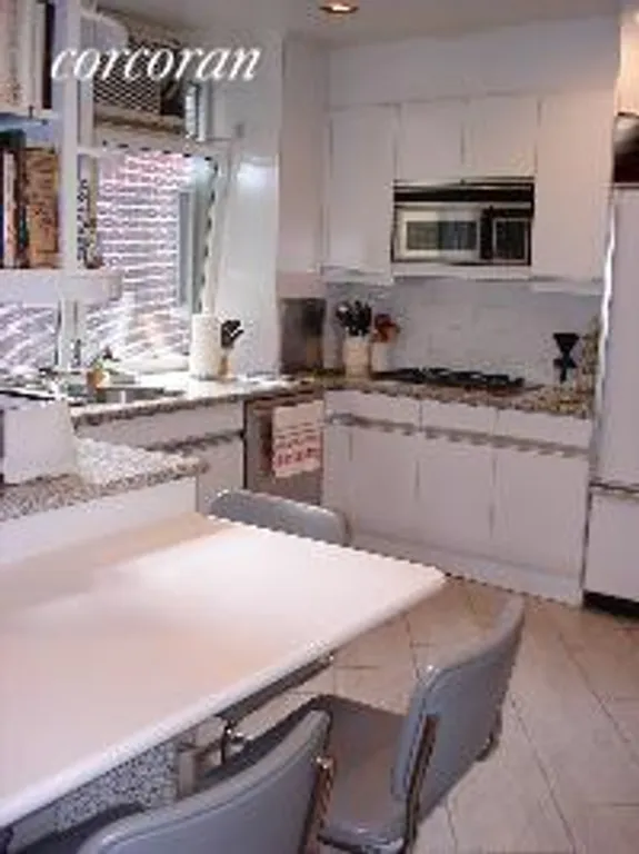New York City Real Estate | View 1112 Park Avenue, 12A | Windowed Eat-in Kitchen | View 8