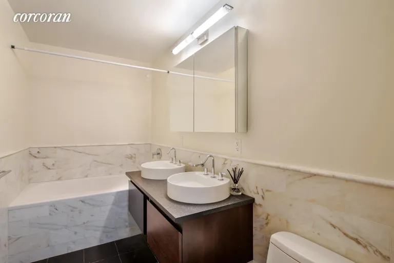 New York City Real Estate | View 462 West 58th Street, 7E | En suite master bathroom with steam shower | View 5