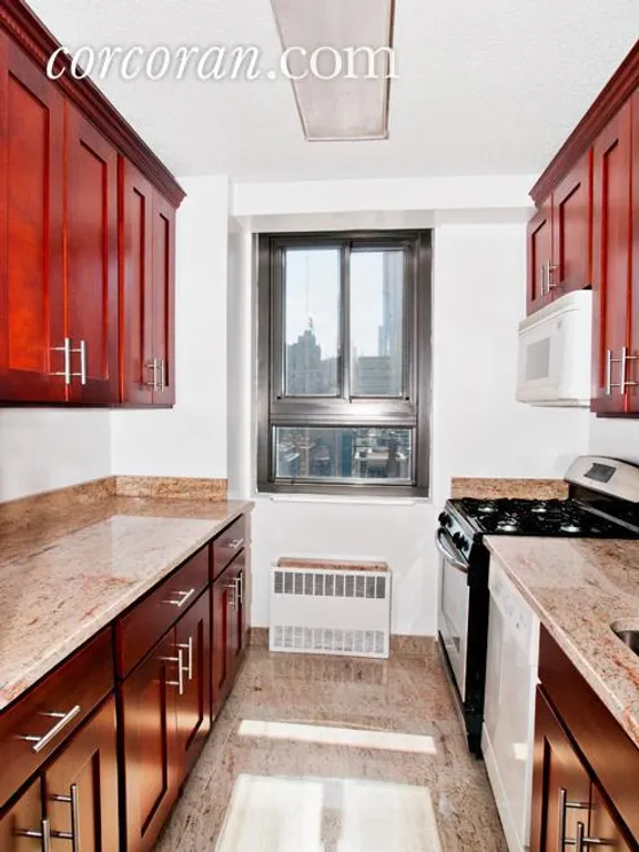 New York City Real Estate | View 347 West 57th Street, 24C | Windowed Kitchen | View 2
