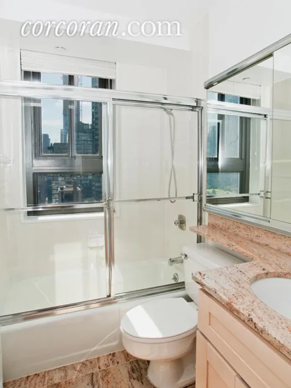 New York City Real Estate | View 347 West 57th Street, 24C | Windowed bathroom | View 5