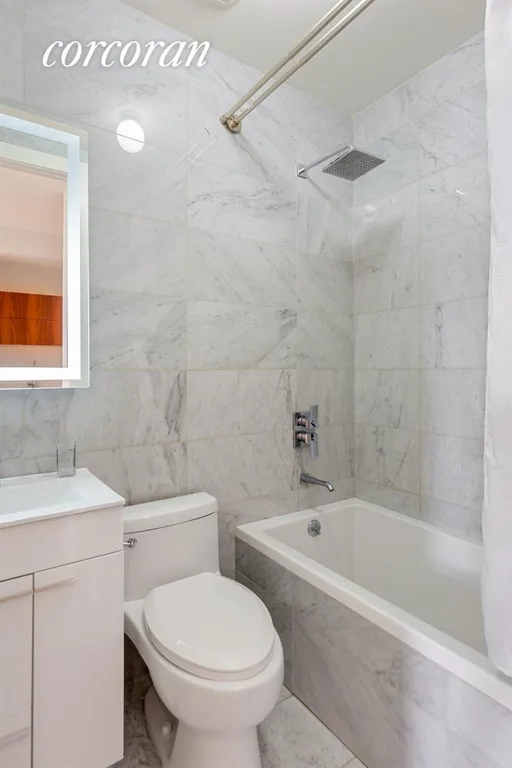 New York City Real Estate | View 131 West 122Nd Street, 2A | Dual-entry marble bathroom | View 4