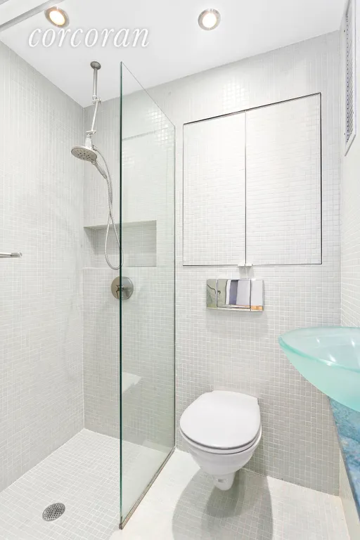 New York City Real Estate | View 221 West 20th Street, 3W | Beautiful Glass Tile Bathroom | View 4