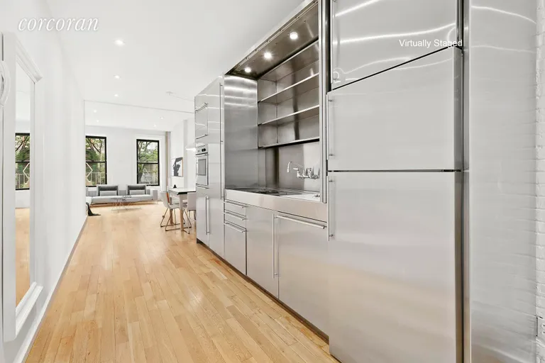 New York City Real Estate | View 221 West 20th Street, 3W | Sleek Modern Kitchen | View 2