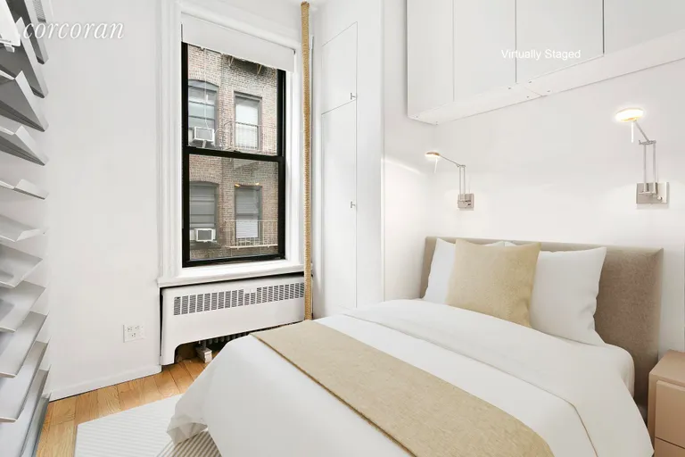 New York City Real Estate | View 221 West 20th Street, 3W | Bedroom with Built in Storage | View 5