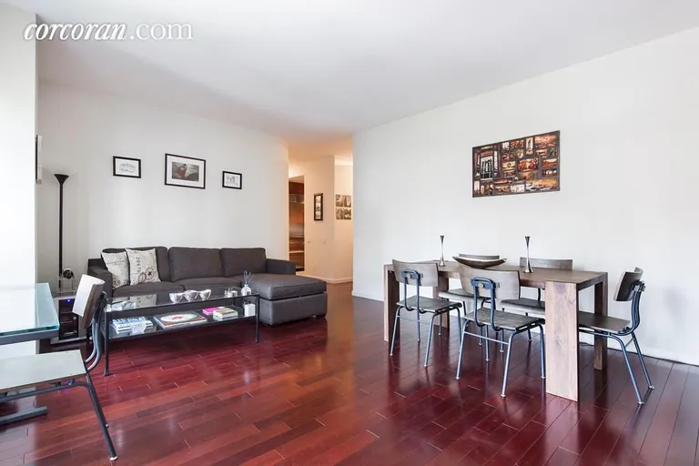 New York City Real Estate | View 100 United Nations Plaza, 16C | Spacious living room with 9' ceilings | View 2