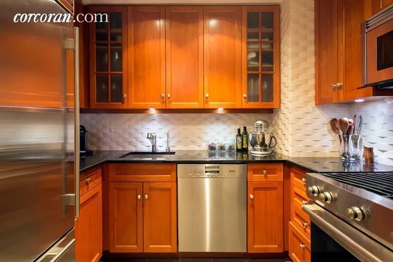 New York City Real Estate | View 100 United Nations Plaza, 16C | Renovated kitchen with high-end appliances | View 3