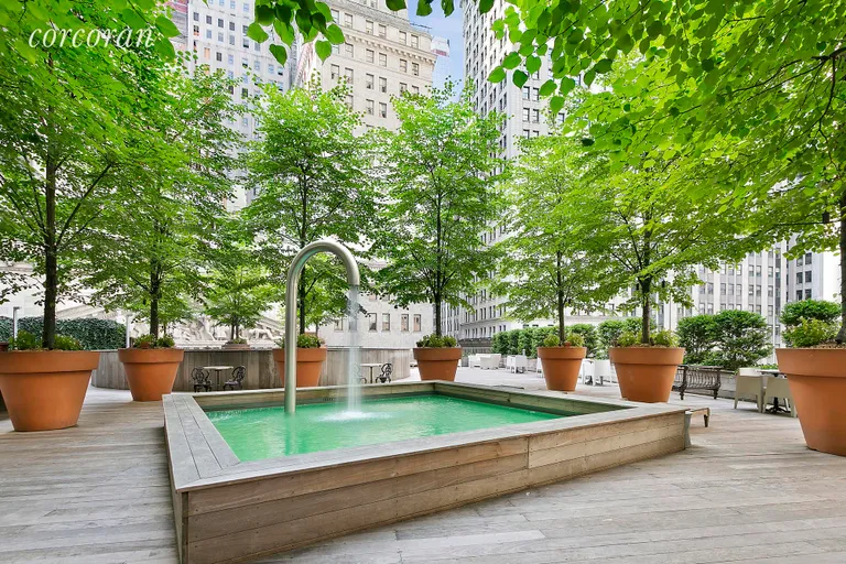 New York City Real Estate | View 15 Broad Street, 1408 | Outdoor Deck overlooking Wall Street | View 6