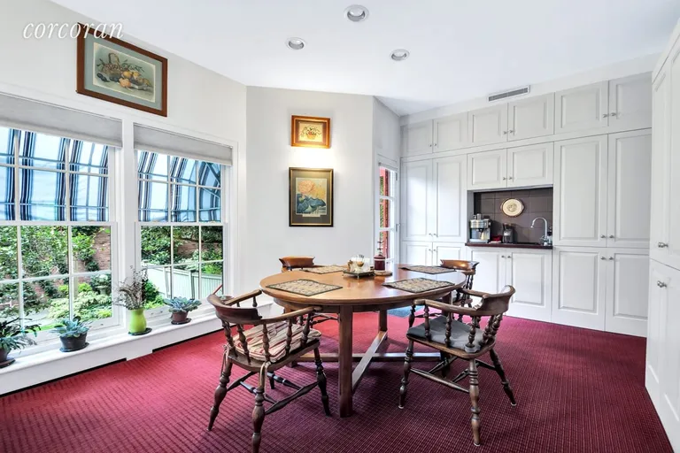 New York City Real Estate | View 12 Monroe Place, 1 | Dining room facing garden | View 6
