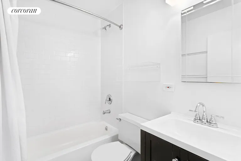 New York City Real Estate | View 77 Bleecker Street, 821E | White-on-white renovated Bathroom. | View 5