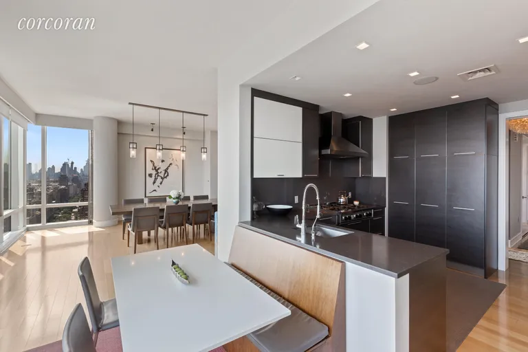 New York City Real Estate | View 245 West 99th Street, 26B | Custom Kitchen wth Breakfast Area | View 3