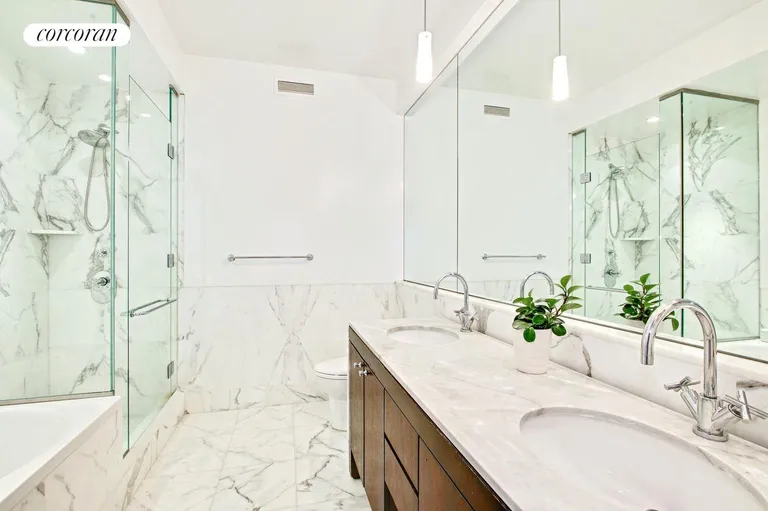 New York City Real Estate | View 230 West 56th Street, 52A | Serene Spa-Like Master Bathroom | View 5