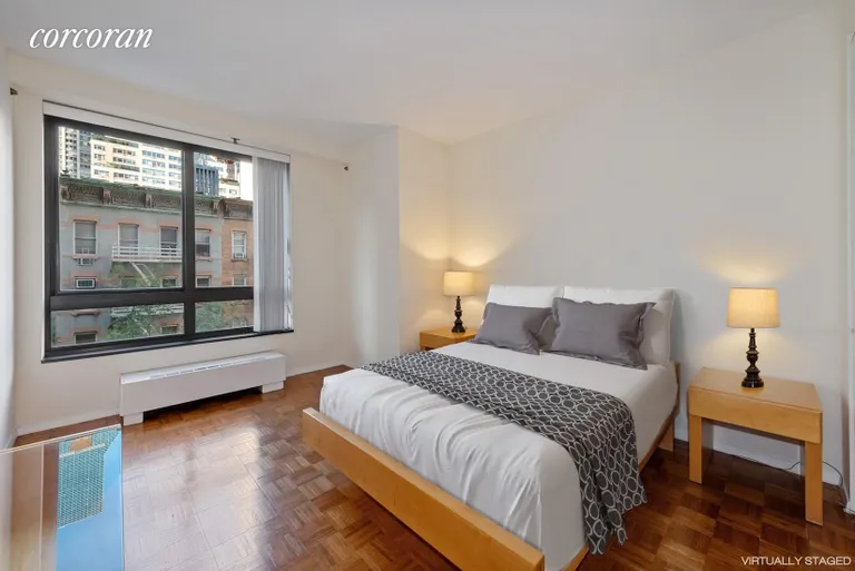 New York City Real Estate | View 100 United Nations Plaza, 5D | Large bedroom with oversized windows | View 3