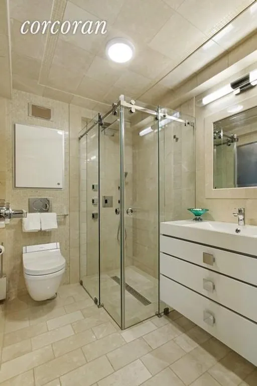 New York City Real Estate | View 40 East 78th Street, 6E | MARBLE MASTER BATHROOM | View 8