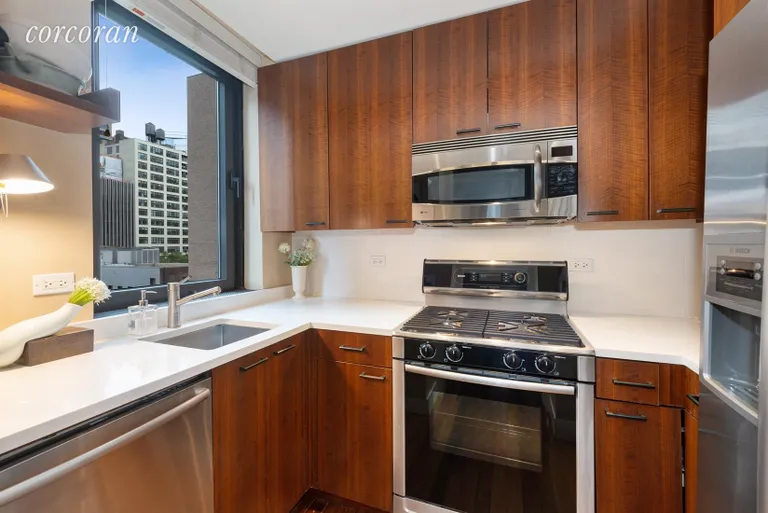 New York City Real Estate | View 100 United Nations Plaza, 9B | Windowed kitchen with Bosch appliances | View 2