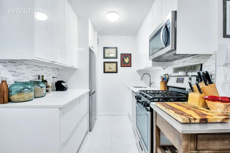 New York City Real Estate | View 301 East 79th Street, 7S | Renovated Open Kitchen Stainless Appliances | View 3