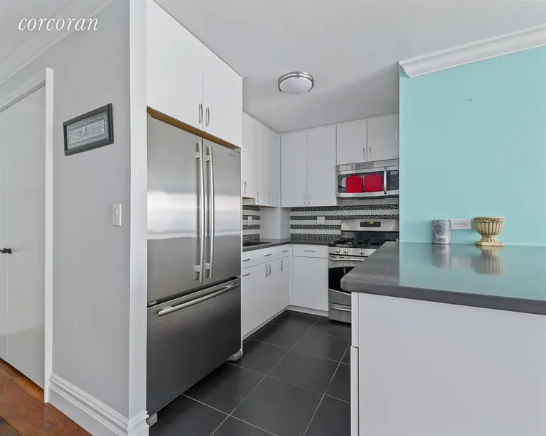 New York City Real Estate | View 16 West 16th Street, 12FN | Open modern kitchen | View 2