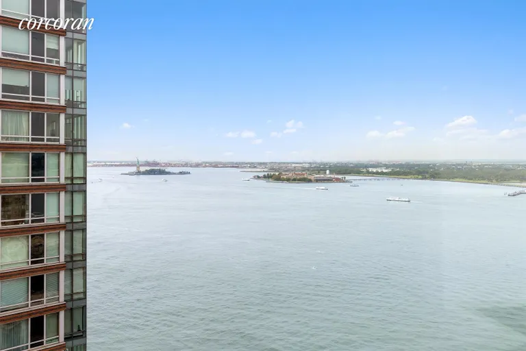New York City Real Estate | View 30 West Street, 27E | View SW of Hudson River and Statue of Liberty | View 3