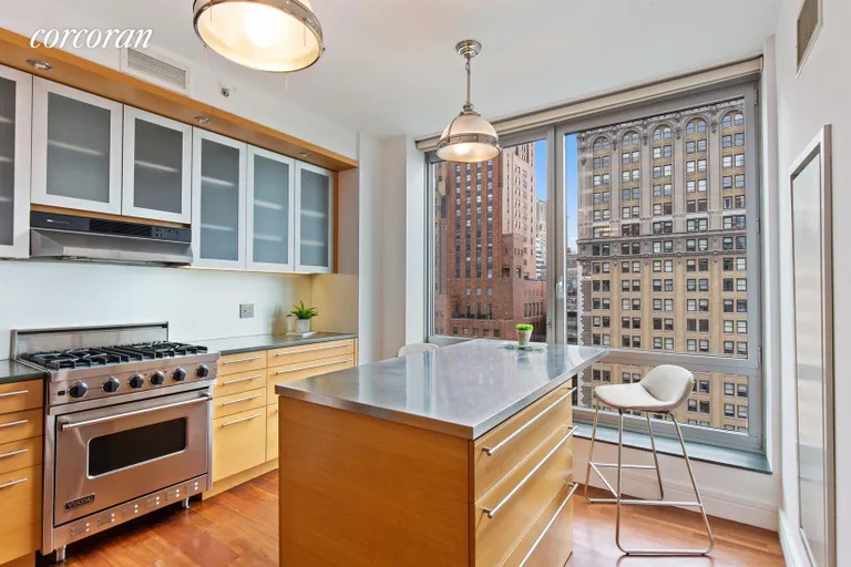 New York City Real Estate | View 30 West Street, 27E | Open Chef's Kitchen with Custom Island | View 4