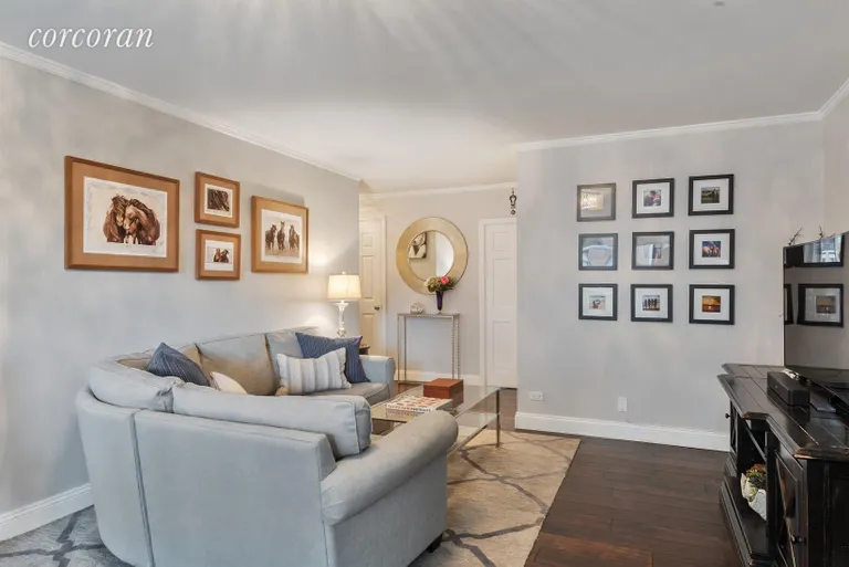 New York City Real Estate | View 1725 York Avenue, 8H | Living Room is Located Off a Gracious Entry Foyer | View 2