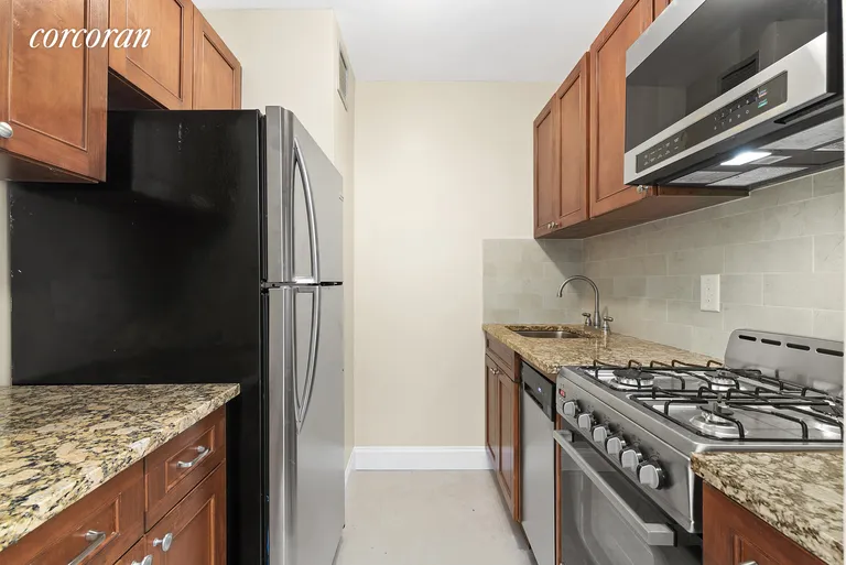 New York City Real Estate | View 301 East 45th Street, 11C | Mint Renovated Kitchen | View 3