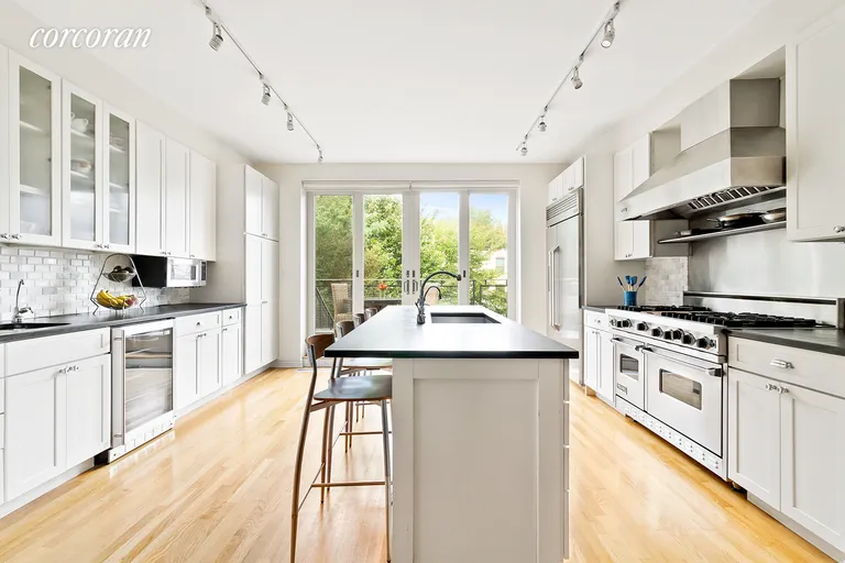 New York City Real Estate | View 455 Sackett Street | Chef's kitchen opens to deck with grill | View 3