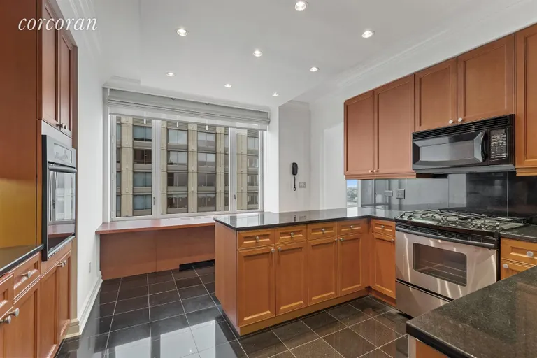 New York City Real Estate | View 220 Riverside Boulevard, 45D | Kitchen w eat in breakfast bar | View 2