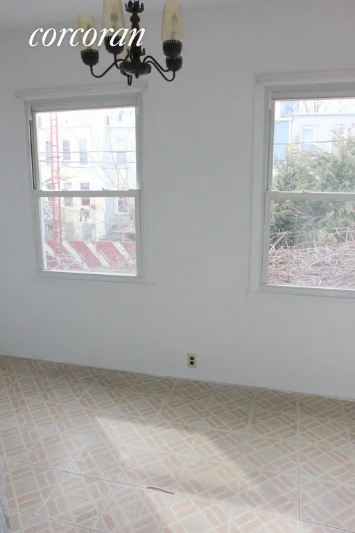 New York City Real Estate | View 652 48th Street, 1 | Porch adjacent to the kitchen | View 9