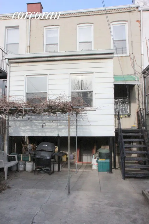 New York City Real Estate | View 652 48th Street, 1 | View of the porch from backyard | View 11