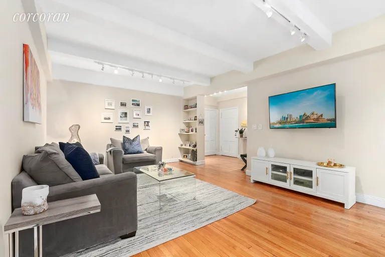 New York City Real Estate | View 230 East 50th Street, 1-A | An oversized living room holds possibilities. | View 2