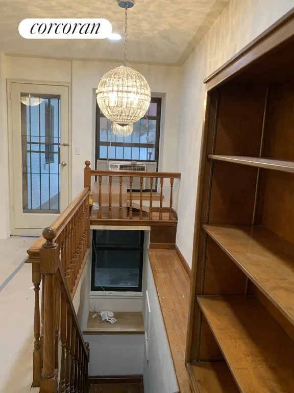 New York City Real Estate | View 25 West 70th Street, B | Straight stairs down to rec. room | View 12