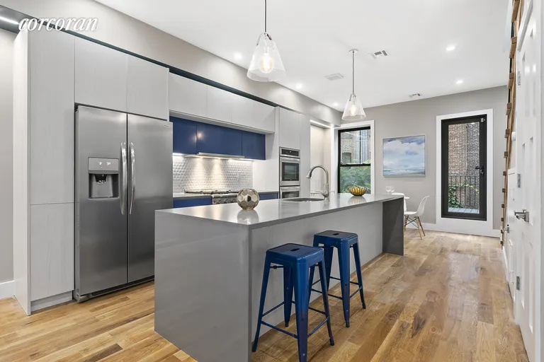 New York City Real Estate | View 20 Revere Place | Massive island and stainless steel appliances! | View 6