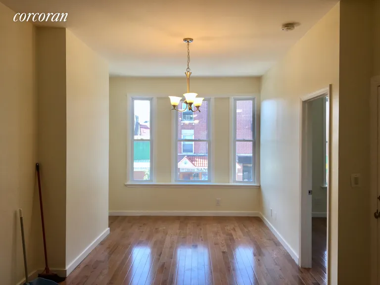 New York City Real Estate | View 7409 3rd Avenue, 2 | Sunny living room | View 2