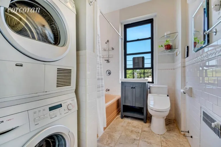 New York City Real Estate | View 25 Parade Place, 6J | bathroom with washer dryer  | View 10