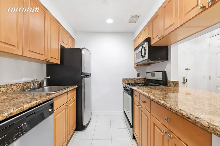 New York City Real Estate | View 9718 Fort Hamilton Pkwy, 2G | Granite counters, steel appliances & pass-through | View 2