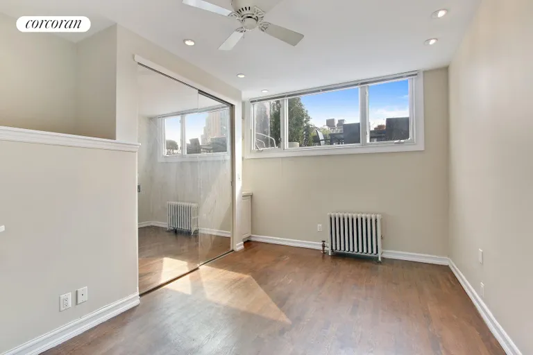 New York City Real Estate | View 233 West 16th Street, 4F | Sun Soaked South Facing Bedroom | View 5