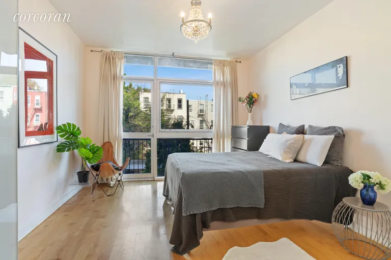 New York City Real Estate | View 82 Guernsey Street, 2A | Master Bedroom with Balcony  | View 3