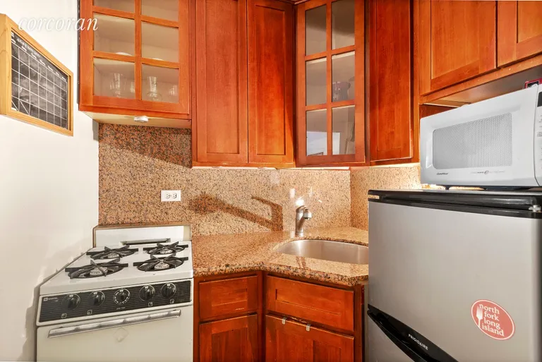 New York City Real Estate | View 311 East 75th Street, 3-B | 2 Kitchen with Open Passway to Living Area | View 2