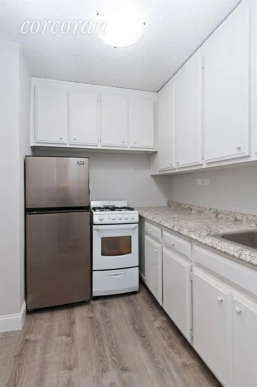 New York City Real Estate | View 77 East 12th Street, 11A | Large Separate Kitchen | View 2