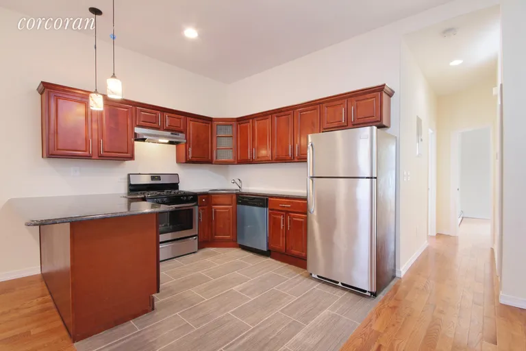 New York City Real Estate | View 1342 Gates Avenue, 1 | Large kitchen with full size appliances | View 3