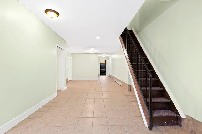 New York City Real Estate | View 1342 Gates Avenue, 1 | Super high ceilings on the garden level! | View 8