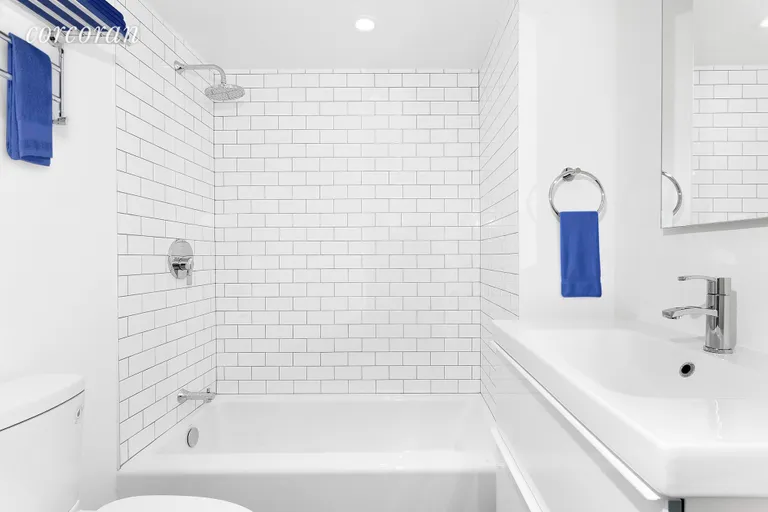 New York City Real Estate | View 526 Leonard Street, 1 | Newly renovated bathroom with vanity storage | View 5