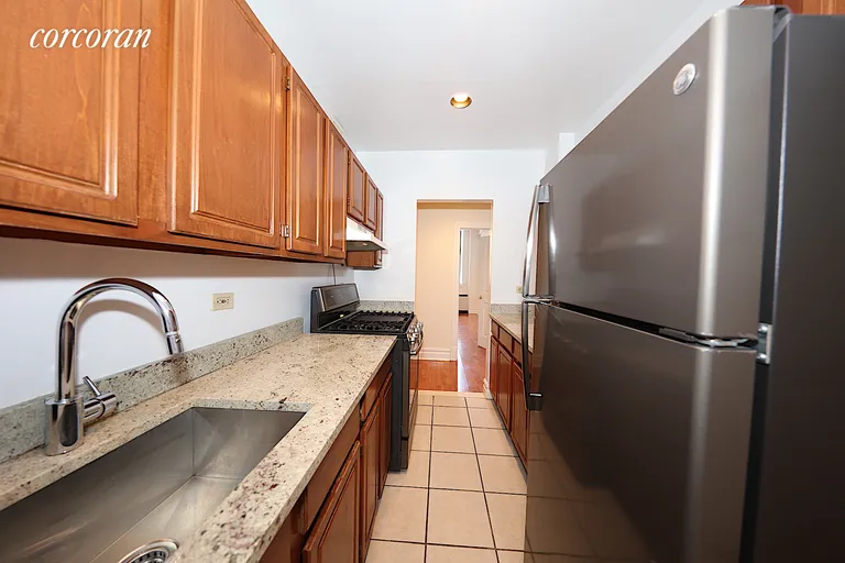 New York City Real Estate | View 45-02 Ditmars Boulevard, 104 | room 2 | View 3