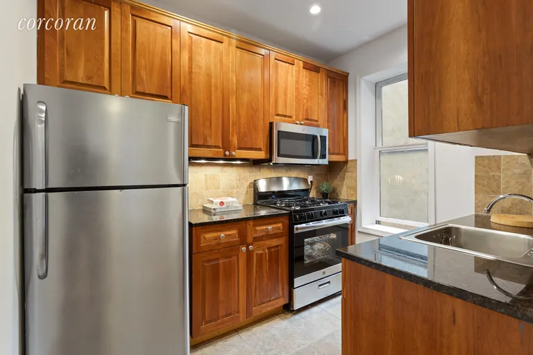 New York City Real Estate | View 145 Prospect Park West, 2b | Attractive kitchen with new range and microwave | View 3